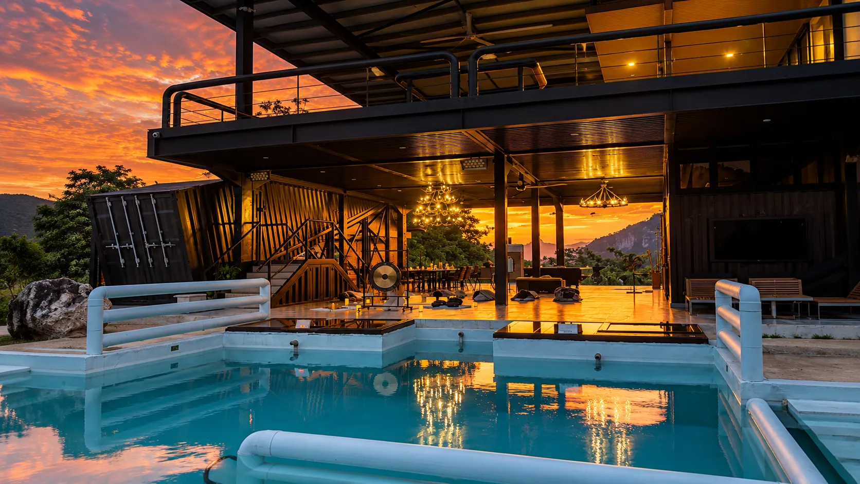 The pool and the house as the sun goes down