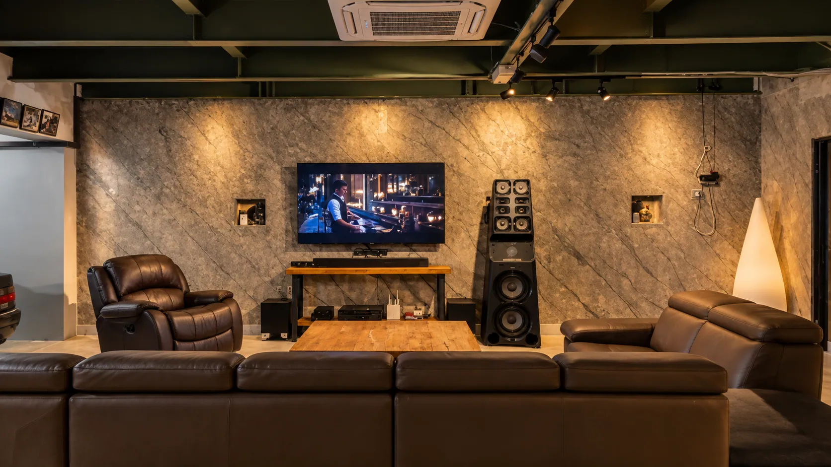 The karaoke lounge with leather sofas and speakers
