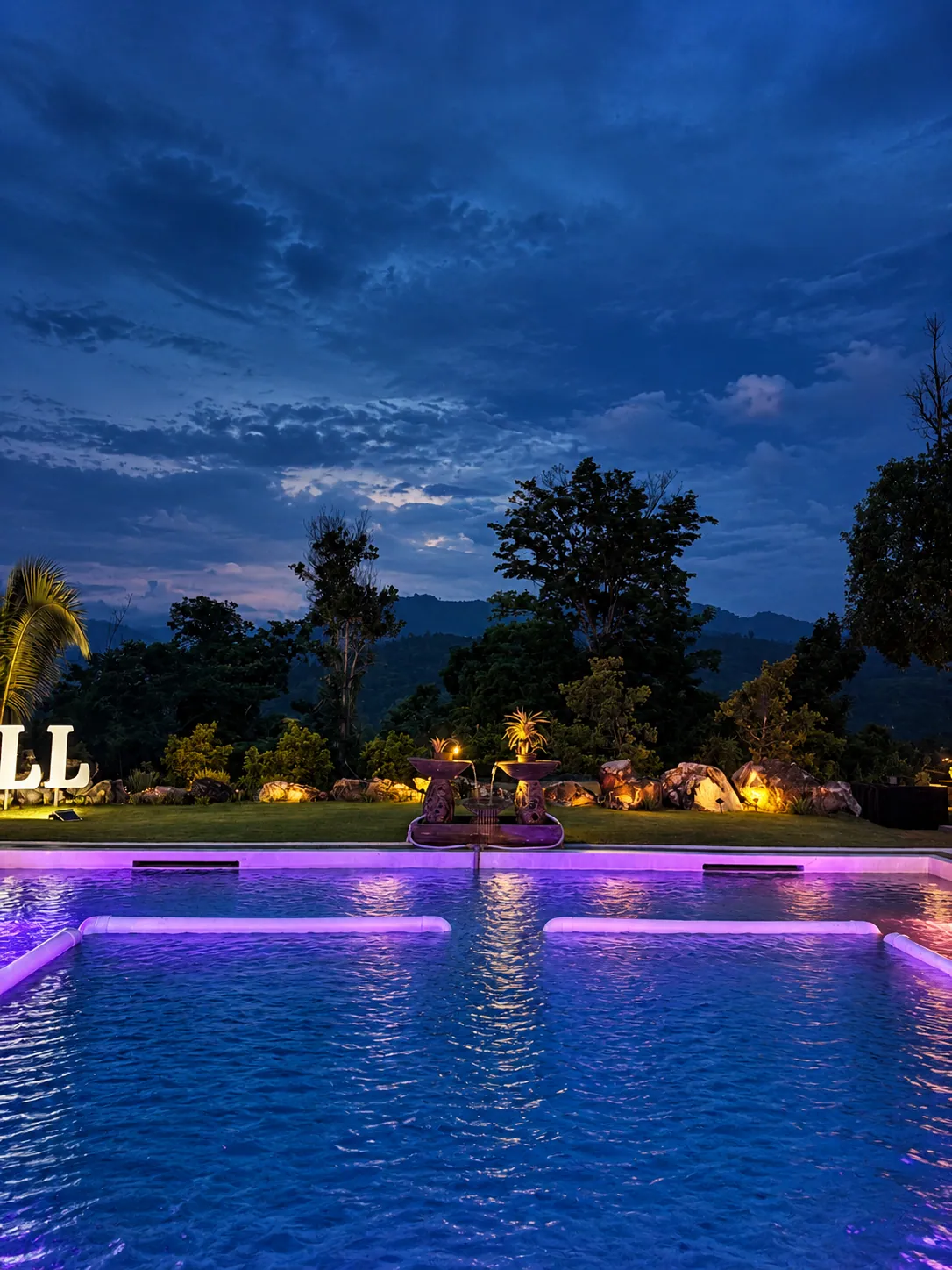 The pool lit up at night